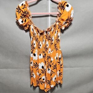 Olivaceous Bright Orange Floral Romper